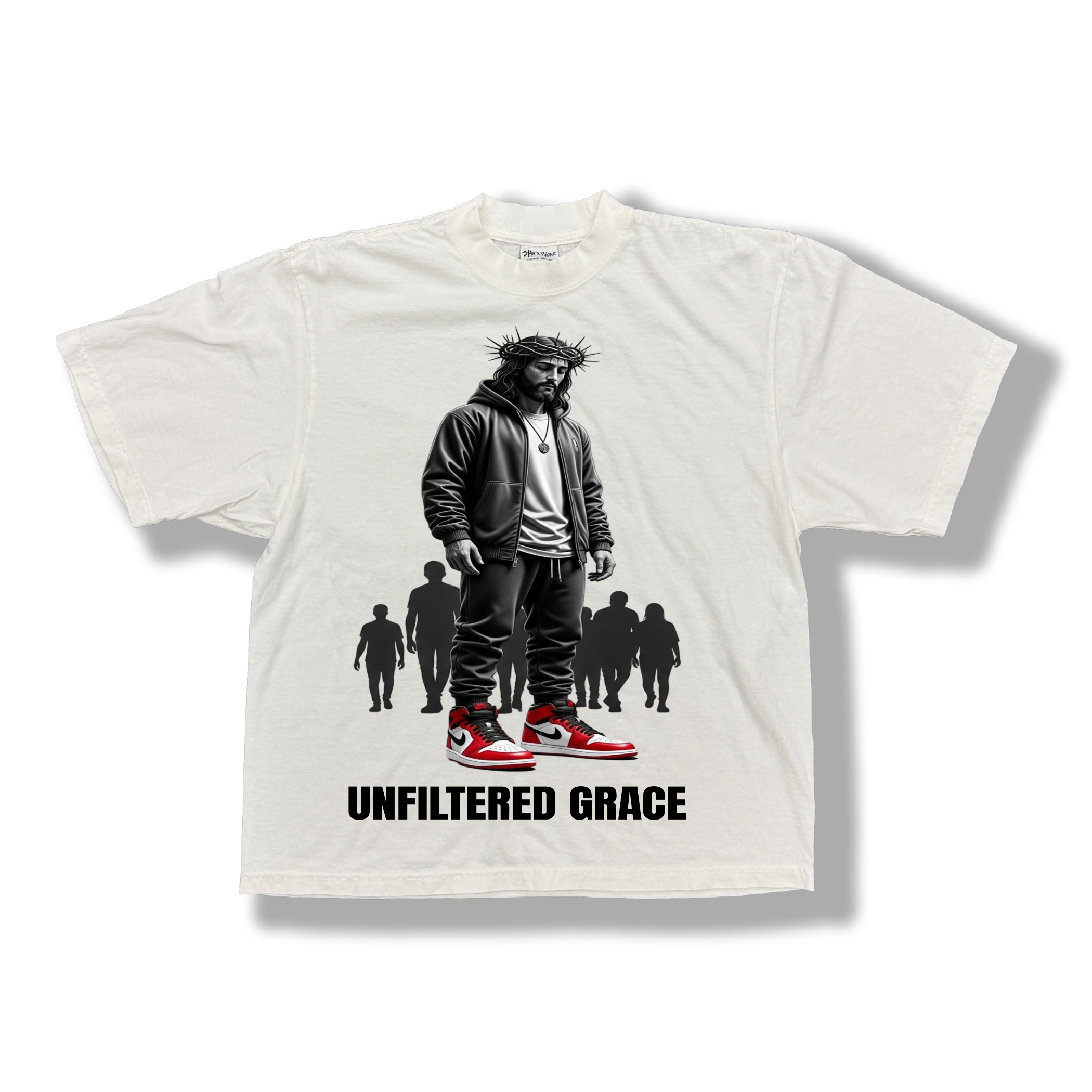 White t-shirt with graphic design of Jesus in modern streetwear with a silhouette of people following behind him and black 'Unfiltered Grace' text