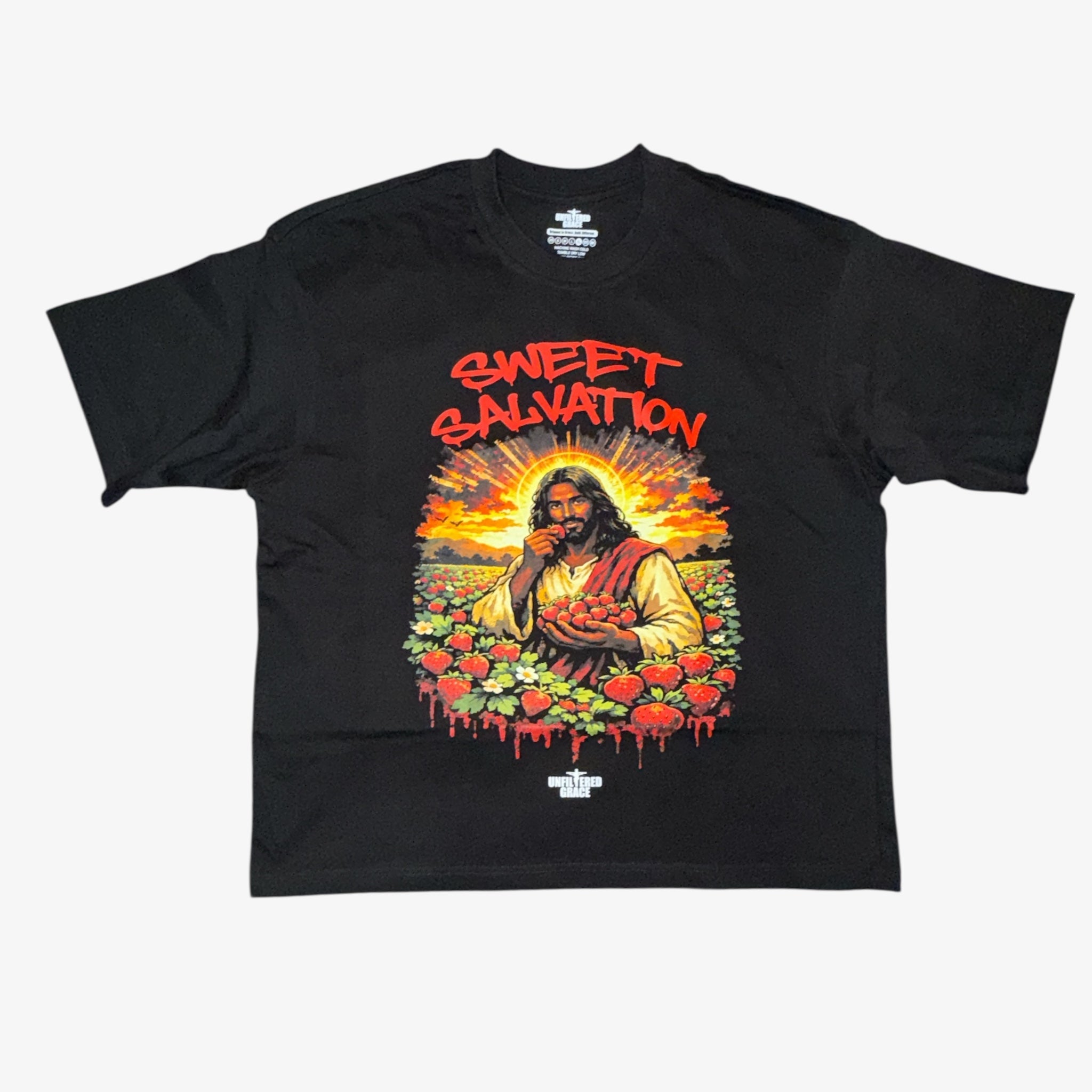 Black t-shirt with 'Sweet Salvation' graphic design featuring Jesus in a field of strawberries.
